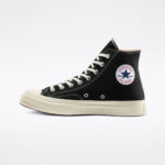 Inner side profile of CDG Play Converse High Top Black featuring Converse Chuck Taylor ankle patch, black canvas material, and off-white rubber midsole.