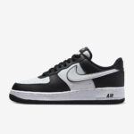 Side profile of Nike Air Force 1 Low Panda DV0788-001 featuring black overlays, white Swoosh, and classic Air Force 1 midsole.