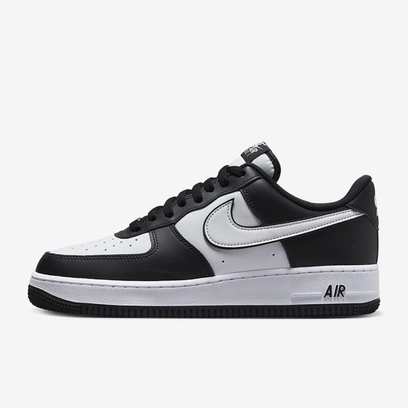 Side profile of Nike Air Force 1 Low Panda DV0788-001 featuring black overlays, white Swoosh, and classic Air Force 1 midsole.