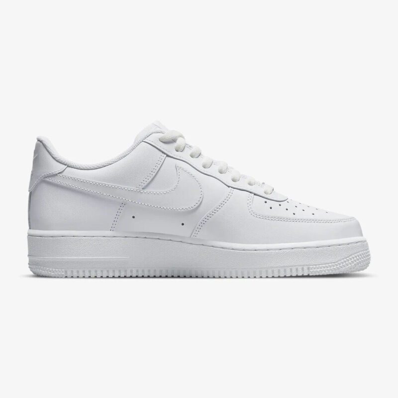 Left side profile of Nike Air Force 1 Low Triple White showing tonal Nike Swoosh, white leather upper, and low-top design.