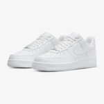 Nike Air Force 1 Low Triple White CW2288-111 in a front angle view with white leather upper and classic AF1 silhouette.