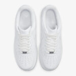 Top view of Nike Air Force 1 Low Triple White showing white laces, perforated toe box, padded collar, and low-top shape.