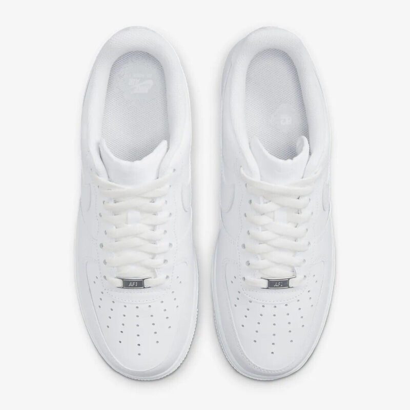 Top view of Nike Air Force 1 Low Triple White showing white laces, perforated toe box, padded collar, and low-top shape.