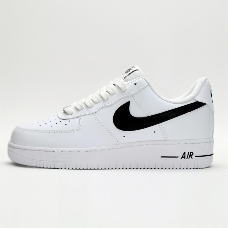 Side profile of Nike Air Force 1 Low White Black CJ0952-100 showing white leather panels, black Nike Swoosh, Air midsole branding, and low-top construction.