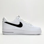 Medial side view of Nike Air Force 1 Low White Black CJ0952-100 showing smooth white leather panels and black Swoosh detailing.
