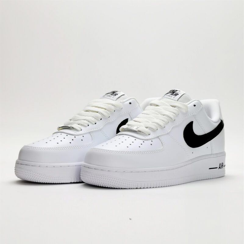 Nike Air Force 1 Low White Black CJ0952-100 sneakers featuring a white leather upper, black Swoosh logo, classic Air Force 1 silhouette, and cushioned sole.