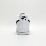 Rear view of Nike Air Force 1 Low White Black CJ0952-100 with embroidered Nike Air branding on the white heel tab.