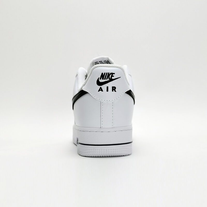 Rear view of Nike Air Force 1 Low White Black CJ0952-100 with embroidered Nike Air branding on the white heel tab.
