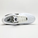 Top-down view of Nike Air Force 1 Low White Black CJ0952-100 featuring perforated toe box, white laces, and Nike Air tongue branding.