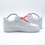Supreme AF1 White sneaker lateral side view with premium leather upper and streetwear inspired styling