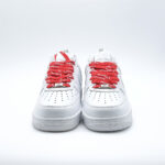 Front-facing view of Supreme Air Force 1 White showcasing perforated toe box and signature red Supreme lace design