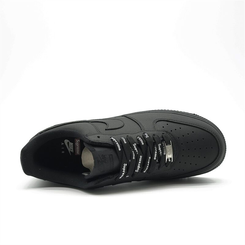 Top-down view of Supreme Black Forces sneaker featuring Supreme laces, padded collar and premium black leather construction.