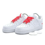 Supreme x Nike Air Force 1 Low White sneakers featuring premium white leather upper and red Supreme branded laces