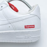Supreme White Air Force 1 side logo detail featuring signature Supreme box logo on white leather panel