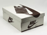 Original Nike Air Jordan shoe box included with Travis Scott Air Jordan 1 Low Velvet Brown sneaker purchase.