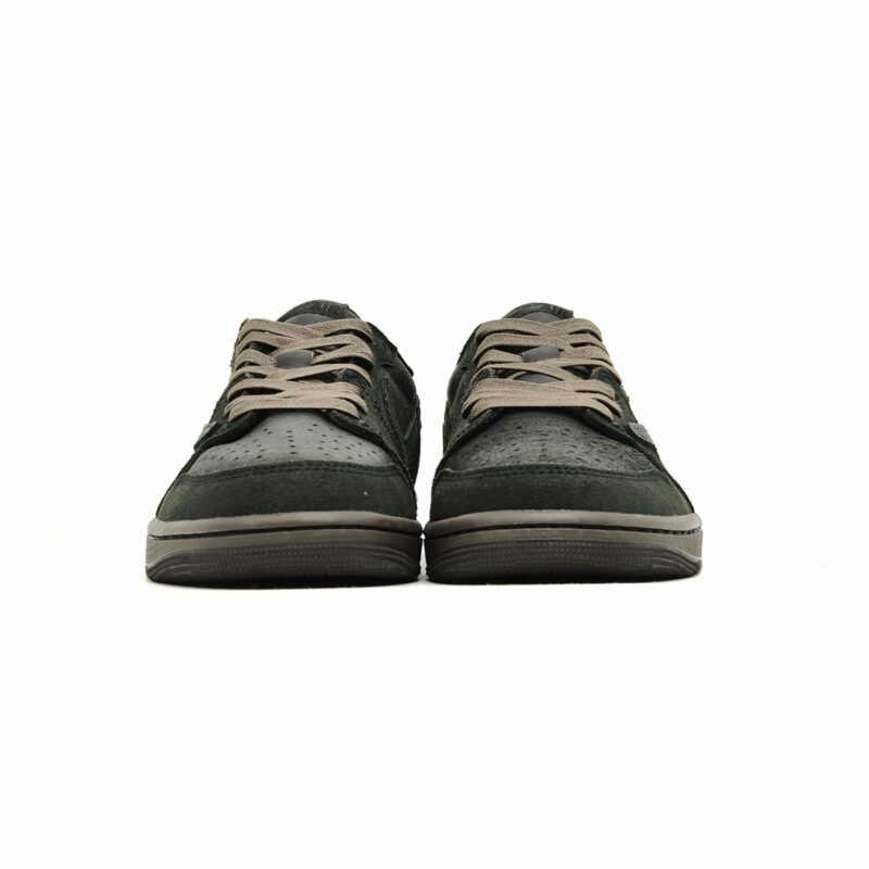 Front-facing view of Travis Scott Air Jordan 1 Low Velvet Brown with dark brown suede toe box, matching laces, and low-top Air Jordan silhouette.