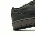 Close-up heel section of Travis Scott Air Jordan 1 Low Velvet Brown showing premium suede panels and durable midsole construction.