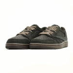 Travis Scott Air Jordan 1 Low Velvet Brown sneakers featuring premium dark brown suede construction, reverse Swoosh branding, and signature Cactus Jack collaboration details.