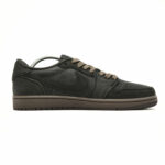 Medial side profile of Travis Scott Air Jordan 1 Low Velvet Brown displaying hidden Cactus Jack branding and premium suede overlays.