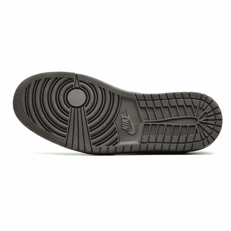 Rubber outsole of Travis Scott Air Jordan 1 Low Velvet Brown featuring classic Air Jordan traction pattern in dark brown.