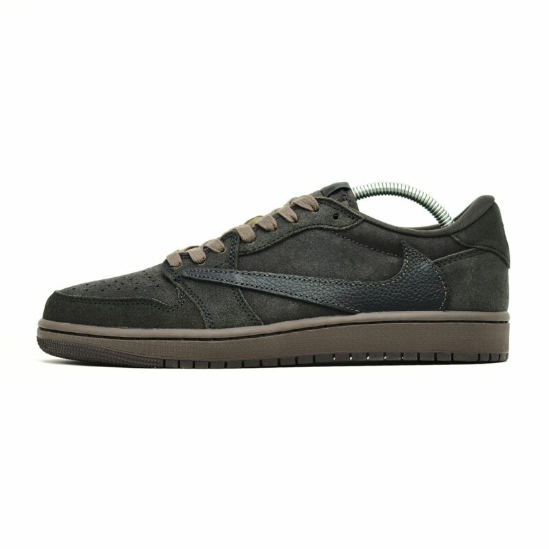 Lateral side view of Travis Scott Air Jordan 1 Low Velvet Brown highlighting the oversized reverse Nike Swoosh and premium suede upper.