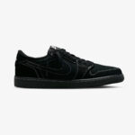 Medial side view of the Travis Scott Jordan 1 Low Black Phantom with Cactus Jack branding and premium black suede construction.