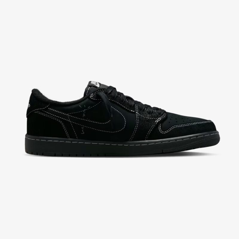 Medial side view of the Travis Scott Jordan 1 Low Black Phantom with Cactus Jack branding and premium black suede construction.