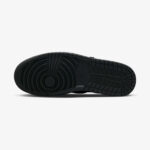 Black rubber outsole of the Travis Scott Jordan 1 Low Black Phantom featuring the classic Air Jordan traction pattern.