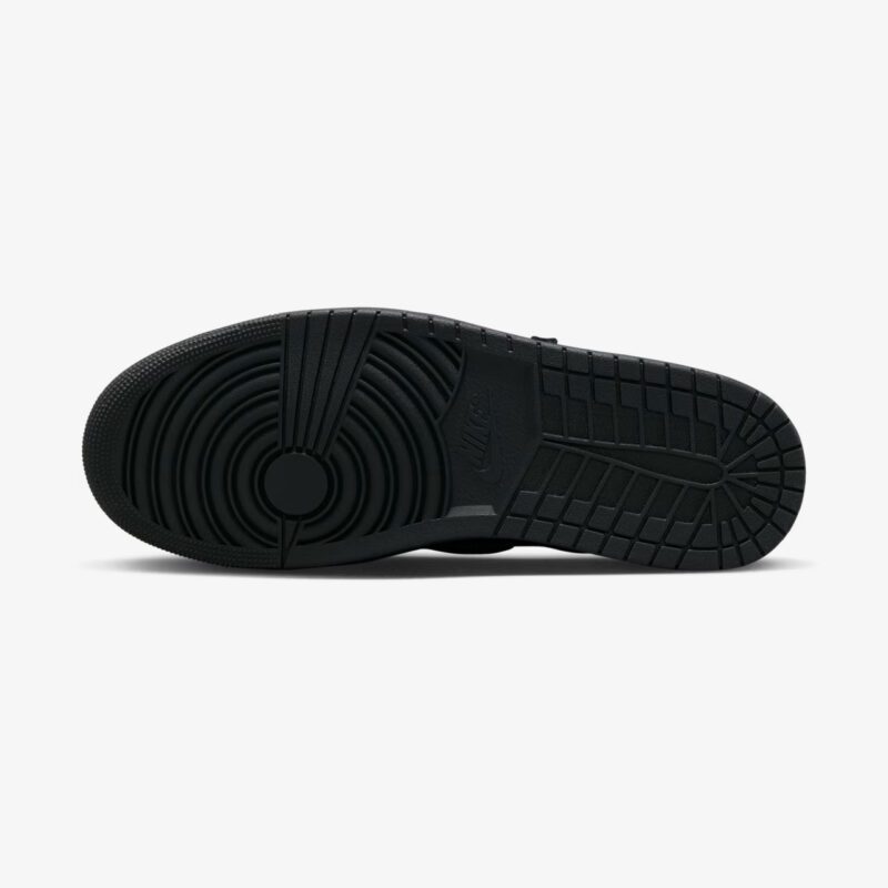 Black rubber outsole of the Travis Scott Jordan 1 Low Black Phantom featuring the classic Air Jordan traction pattern.