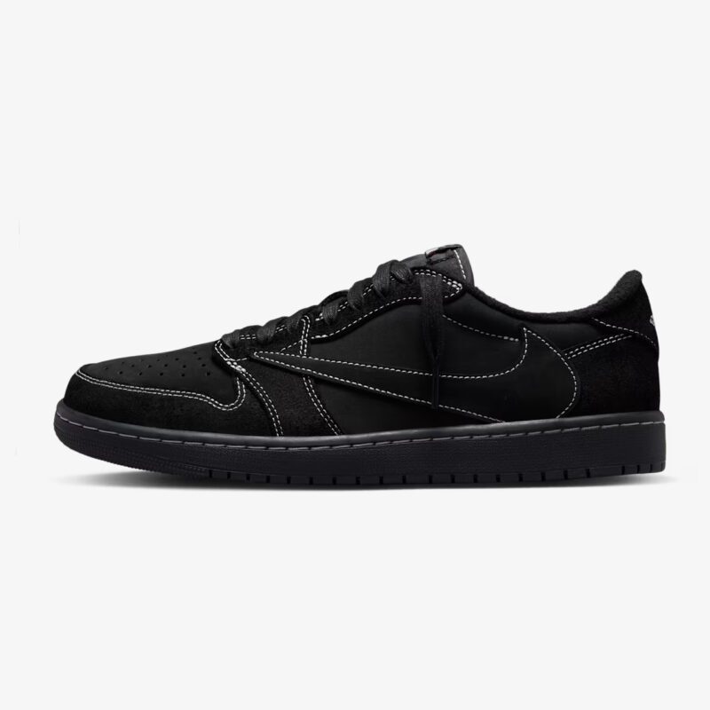 Side profile of the Travis Scott Jordan 1 Low Black Phantom featuring the oversized reverse Swoosh, premium black suede panels, and contrast stitching.