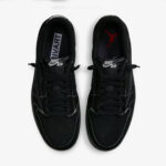 Top-down view of the Travis Scott Jordan 1 Low Black Phantom showing perforated toe box, black laces, Nike Air tongue labels, and premium interior branding.