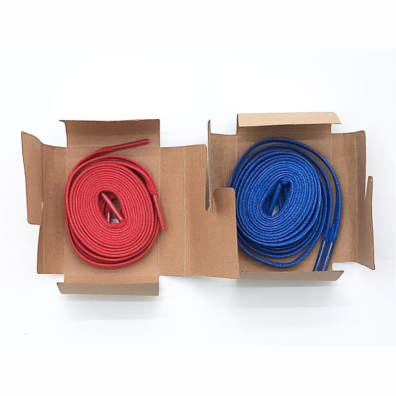 Extra red and blue replacement laces included with Travis Scott Jordan 1 Low Canary sneakers.