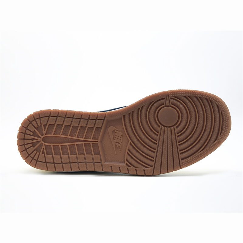 Gum rubber outsole of Travis Scott Jordan 1 Low Canary with classic Air Jordan traction pattern.