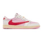 Medial view of Air Jordan 1 Low Travis Scott Tropical Pink displaying smooth leather construction and signature collaboration details.
