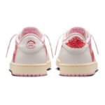Rear view of Travis Scott Jordan 1 Low Tropical Pink featuring embroidered Wings logo and Cactus Jack branding.